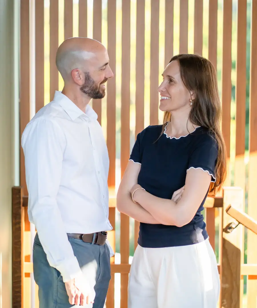 Two members of the Constellation Therapies team in conversation in warm afternoon light