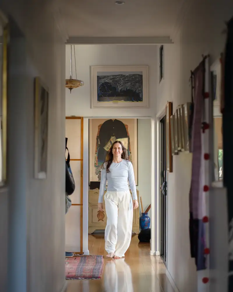 A Constellation clinician walking through a light-filled clinic space