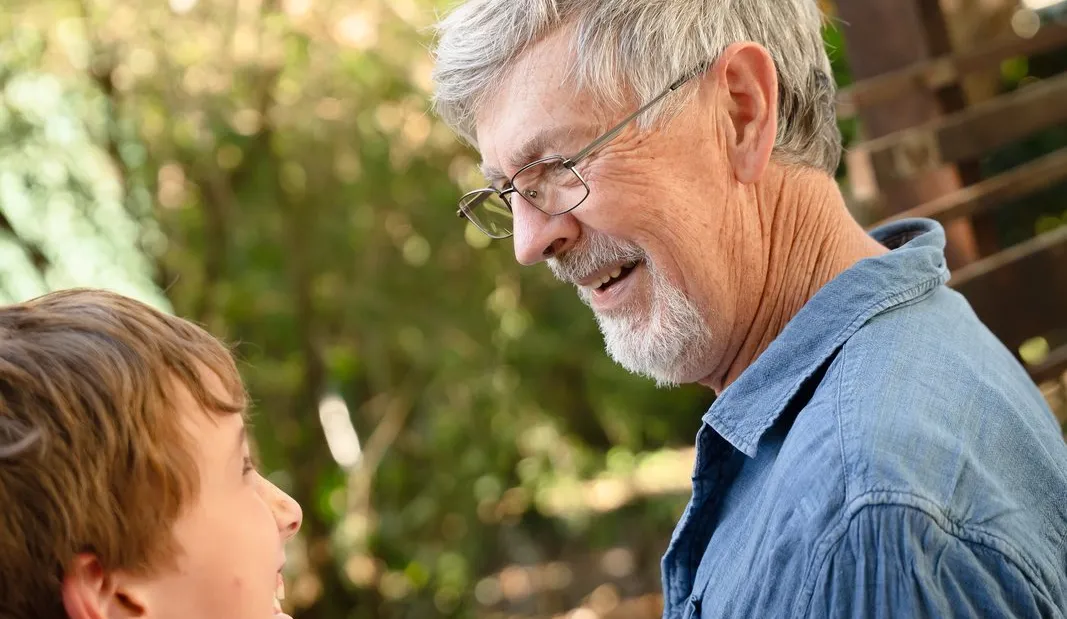 A clinician reviewing a participant's NDIS report