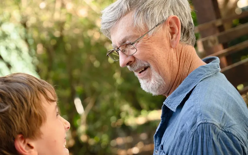 A clinician reviewing a participant's NDIS report