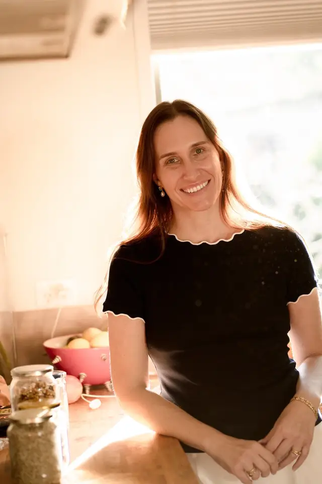 A person relaxed at home in warm afternoon light